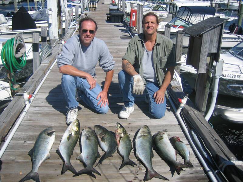 Capt. Karl Chunking Stripers on the old boat!